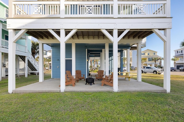 view of patio featuring a fire pit