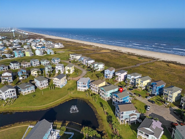 aerial view featuring a residential view and a water view