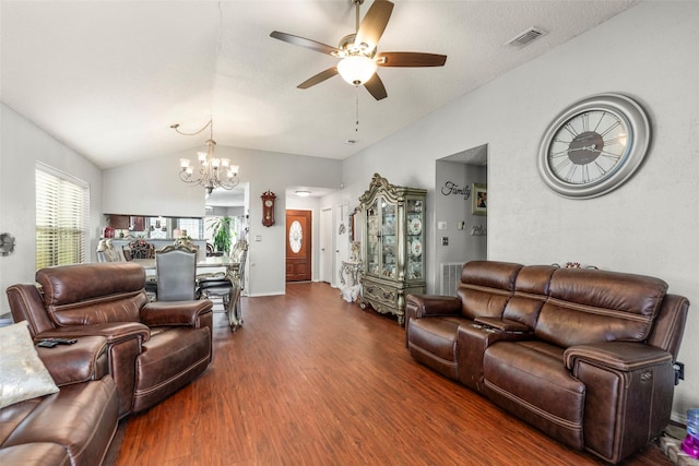 living room with ceiling fan with notable chandelier, lofted ceiling, wood finished floors, and visible vents