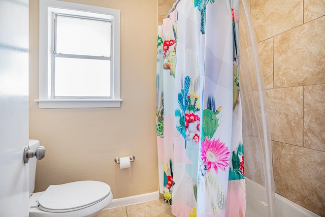 full bathroom with tile patterned flooring, shower / tub combo, toilet, and baseboards