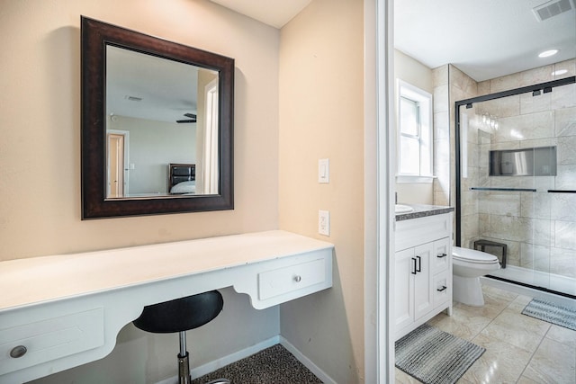 full bathroom featuring visible vents, a shower stall, baseboards, toilet, and vanity