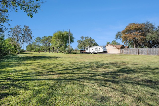 view of yard with fence