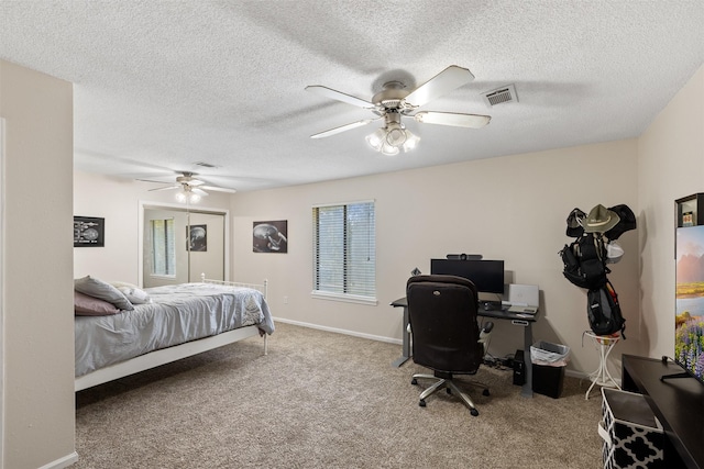 bedroom with visible vents, ceiling fan, baseboards, and carpet