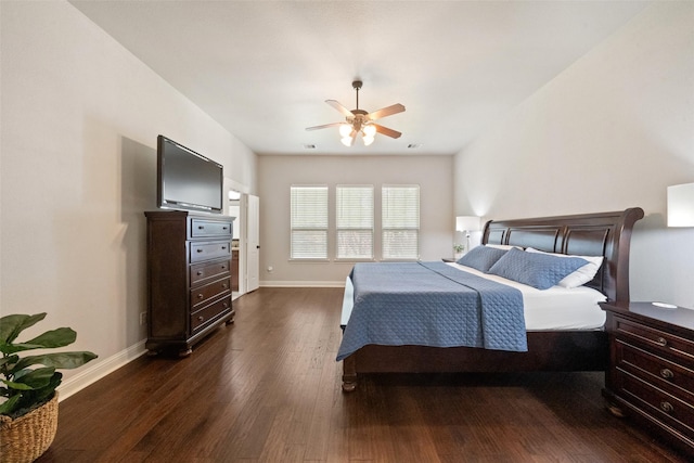 bedroom featuring dark wood-style floors, baseboards, and ceiling fan