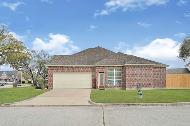 7419 Place Vendome, Spring, TX 77379 - view of front of property with driveway, an attached garage, a shingled roof, and brick siding