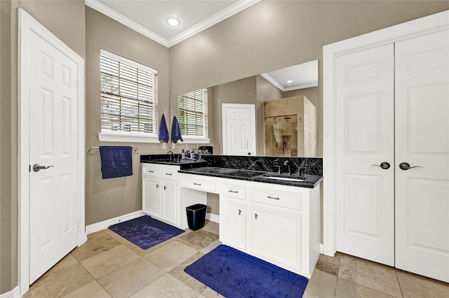 7419 Place Vendome, Spring, TX 77379 - full bathroom featuring crown molding, double vanity, baseboards, a tile shower, and recessed lighting