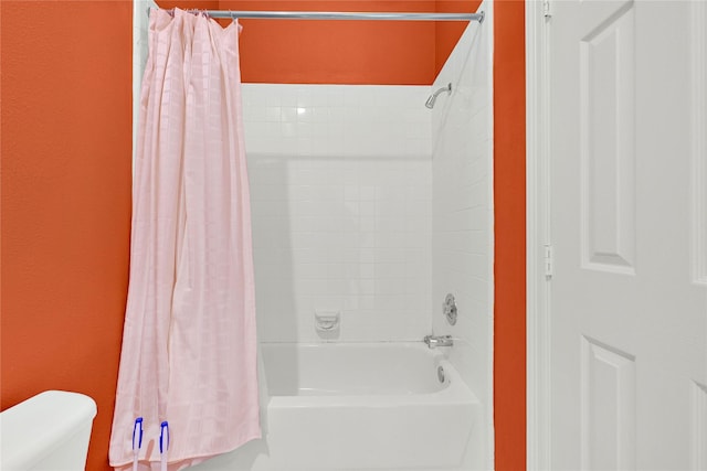 7419 Place Vendome, Spring, TX 77379 - full bathroom featuring shower / bathtub combination with curtain and toilet