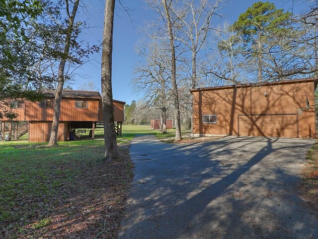 view of road with aphalt driveway