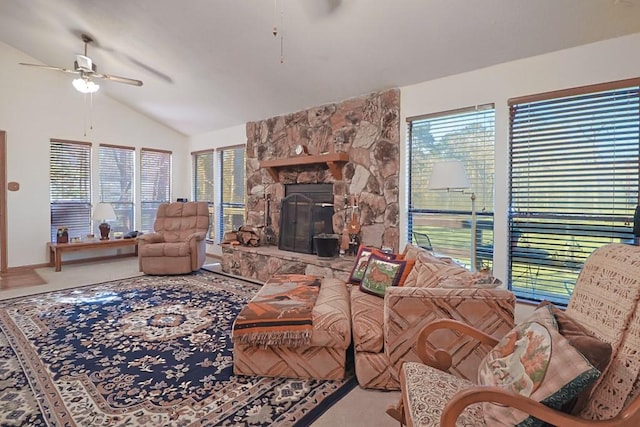 carpeted living room featuring a fireplace, ceiling fan, and vaulted ceiling