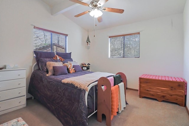 carpeted bedroom featuring lofted ceiling with beams and a ceiling fan