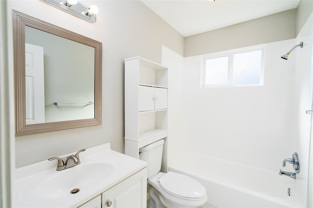 full bathroom with bathing tub / shower combination, toilet, and vanity