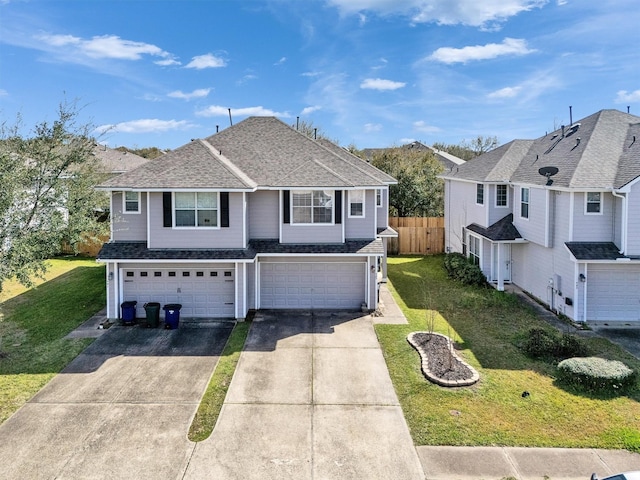 view of front of home featuring a shingled roof, a front lawn, fence, concrete driveway, and a garage