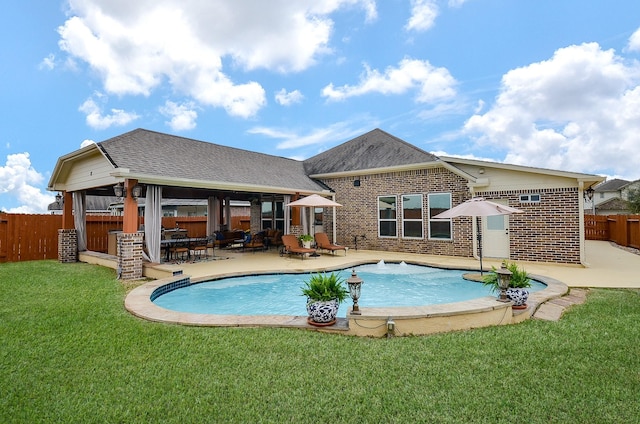 view of pool featuring a patio, a fenced backyard, a fenced in pool, and a lawn