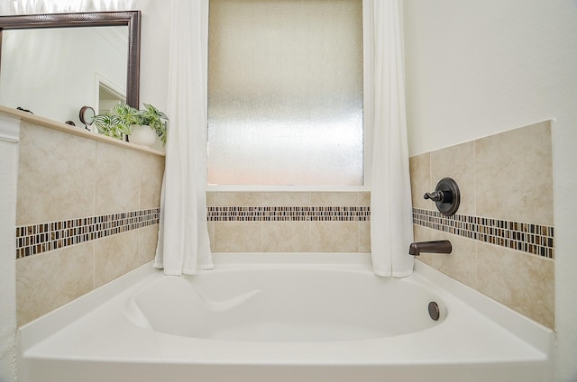 full bathroom featuring a bath