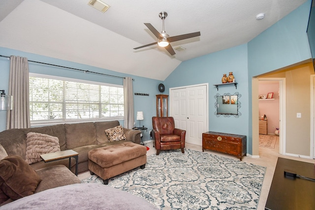 living room featuring visible vents, carpet floors, ceiling fan, and vaulted ceiling