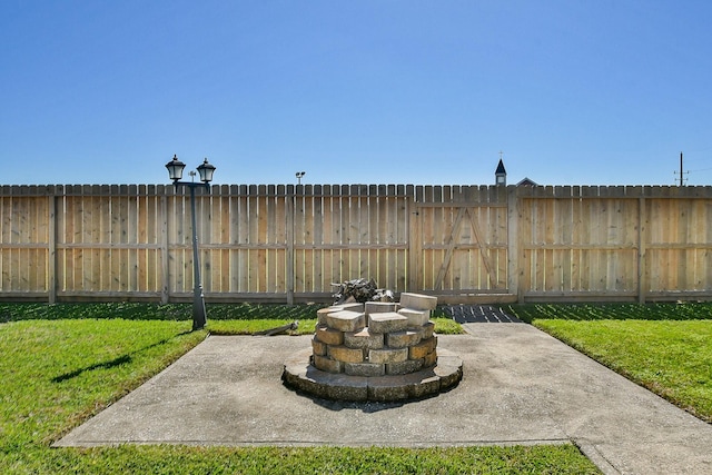 view of patio / terrace featuring fence