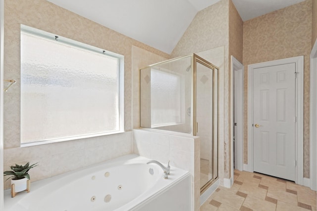 bathroom with vaulted ceiling, a shower stall, wallpapered walls, and a whirlpool tub