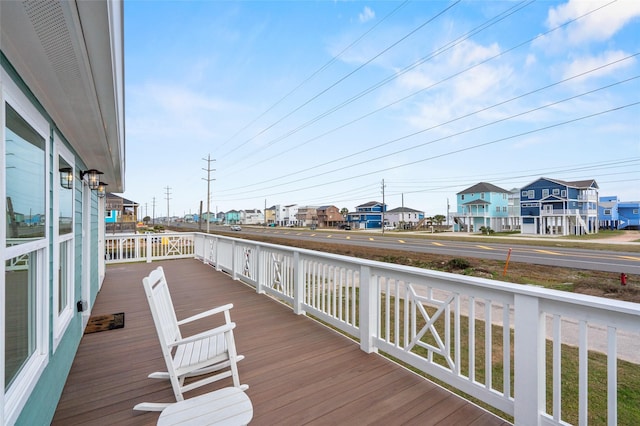 23138 Verano Dr, Galveston, TX 77554 - wooden terrace featuring a residential view