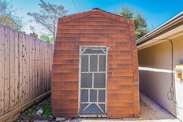 view of outdoor structure with fence