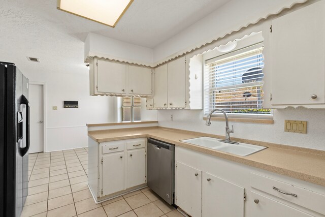 kitchen with light tile patterned floors, a sink, dishwasher, and black refrigerator with ice dispenser