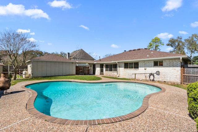 view of swimming pool with a fenced in pool and a fenced backyard