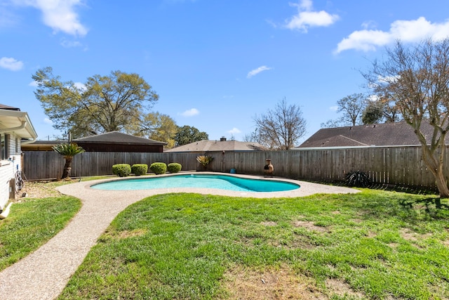 view of pool featuring a fenced in pool, a fenced backyard, and a lawn