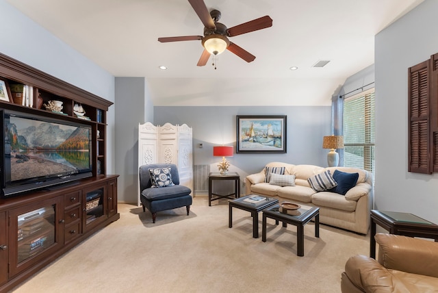 living area with recessed lighting, visible vents, light carpet, and ceiling fan