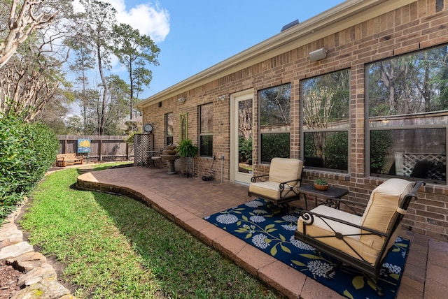 view of yard featuring a patio area and fence