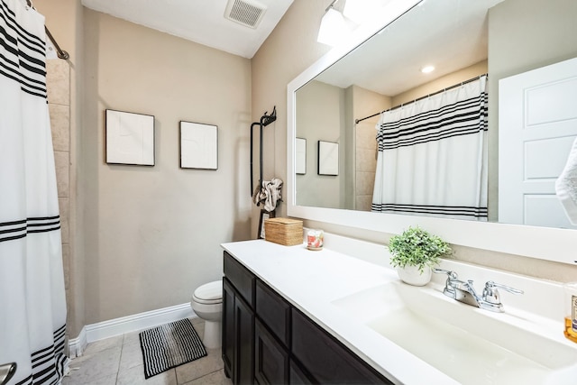 full bath featuring vanity, baseboards, visible vents, tile patterned flooring, and toilet