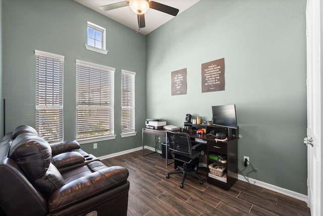 office space featuring ceiling fan, baseboards, and wood tiled floor