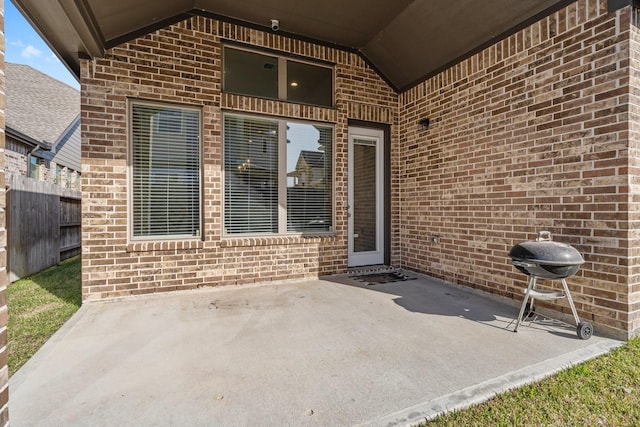 view of patio featuring a grill