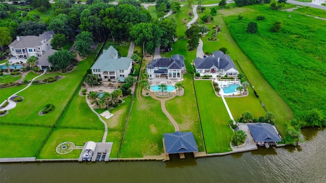 aerial view featuring a residential view and a water view