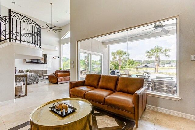 18752 Palm Beach Blvd, Montgomery, TX 77356 - living room featuring ceiling fan and baseboards