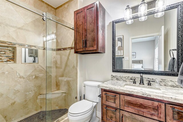 18752 Palm Beach Blvd, Montgomery, TX 77356 - bathroom featuring a shower stall, vanity, and toilet