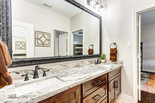 18752 Palm Beach Blvd, Montgomery, TX 77356 - full bath featuring double vanity and baseboards