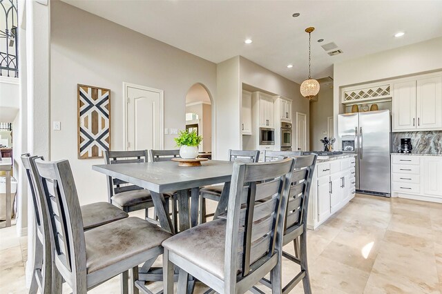 18752 Palm Beach Blvd, Montgomery, TX 77356 - dining room with arched walkways and recessed lighting