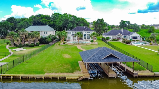 18752 Palm Beach Blvd, Montgomery, TX 77356 - dock with a water view, boat lift, and a fenced backyard