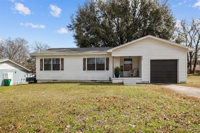 single story home featuring a porch, a garage, driveway, and a front lawn