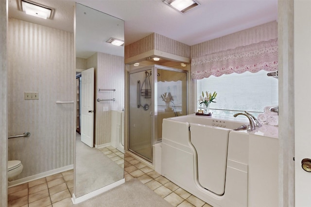 bathroom featuring visible vents, a shower stall, wallpapered walls, toilet, and a bath