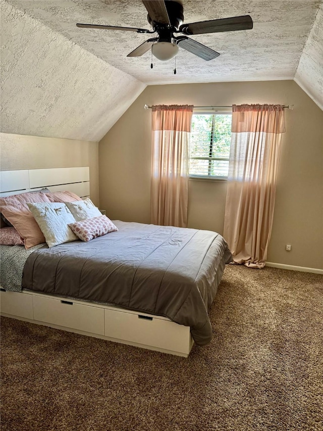 bedroom featuring carpet floors, a textured ceiling, and lofted ceiling