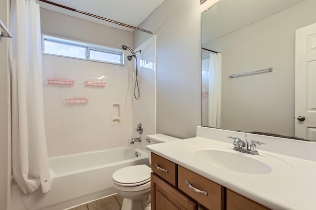 bathroom with tile patterned floors, vanity, toilet, and shower / tub combo