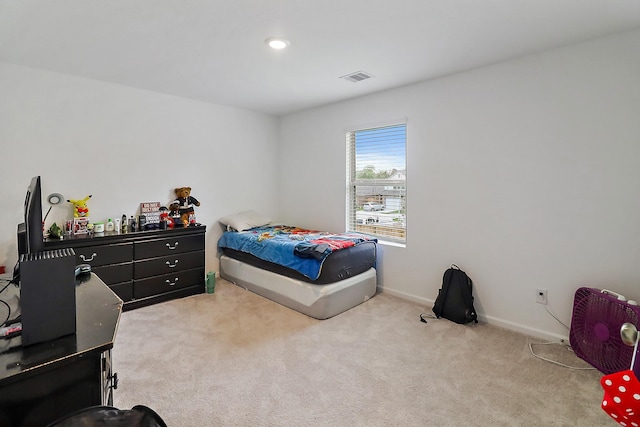 bedroom with visible vents, baseboards, and carpet floors