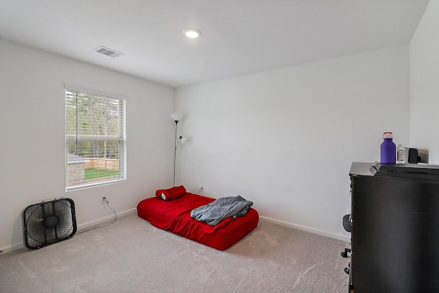 bedroom with visible vents, baseboards, and carpet flooring