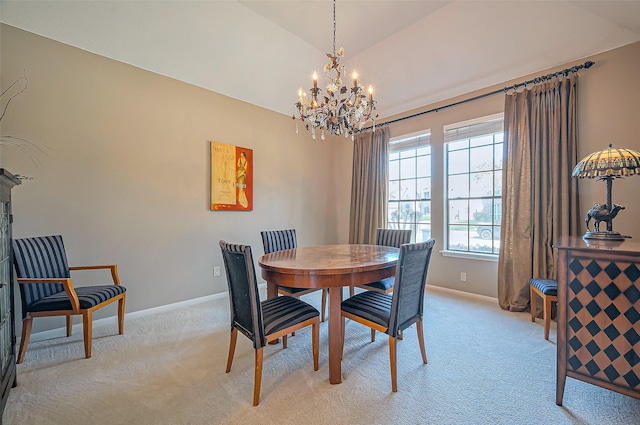 dining space with vaulted ceiling, light colored carpet, baseboards, and a chandelier