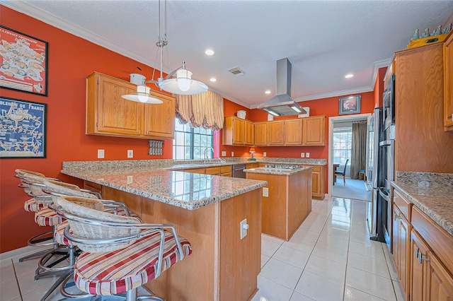 kitchen featuring ornamental molding, island exhaust hood, a sink, a peninsula, and light tile patterned floors