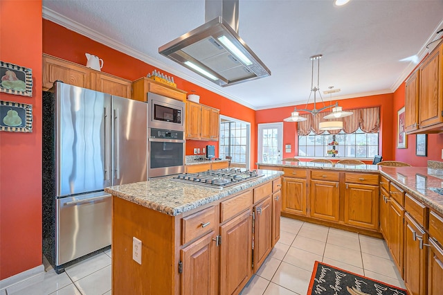 kitchen featuring extractor fan, appliances with stainless steel finishes, and crown molding