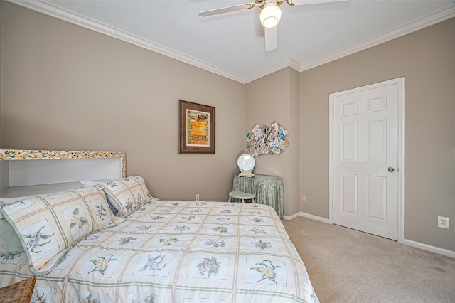 bedroom with ceiling fan, carpet, baseboards, and ornamental molding