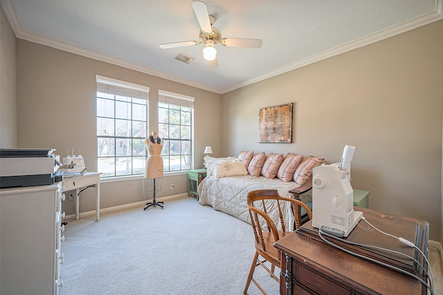 living room featuring crown molding, a ceiling fan, visible vents, and carpet floors