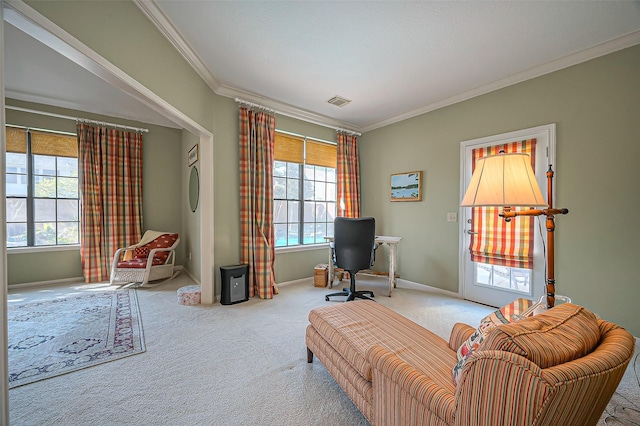 sitting room featuring visible vents, baseboards, crown molding, and carpet