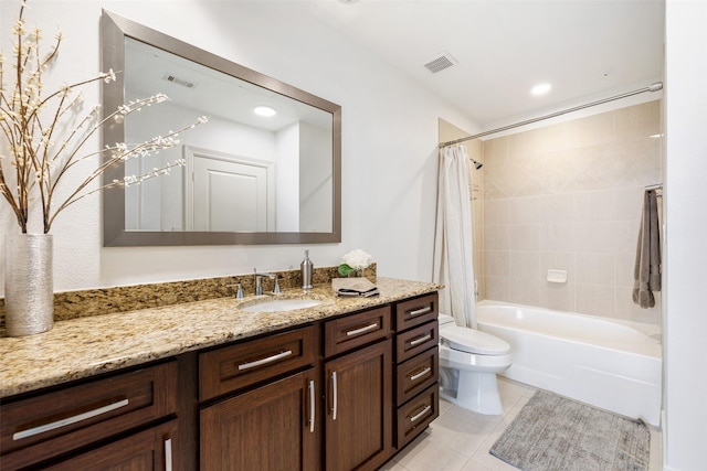 full bathroom featuring tile patterned floors, visible vents, toilet, and vanity